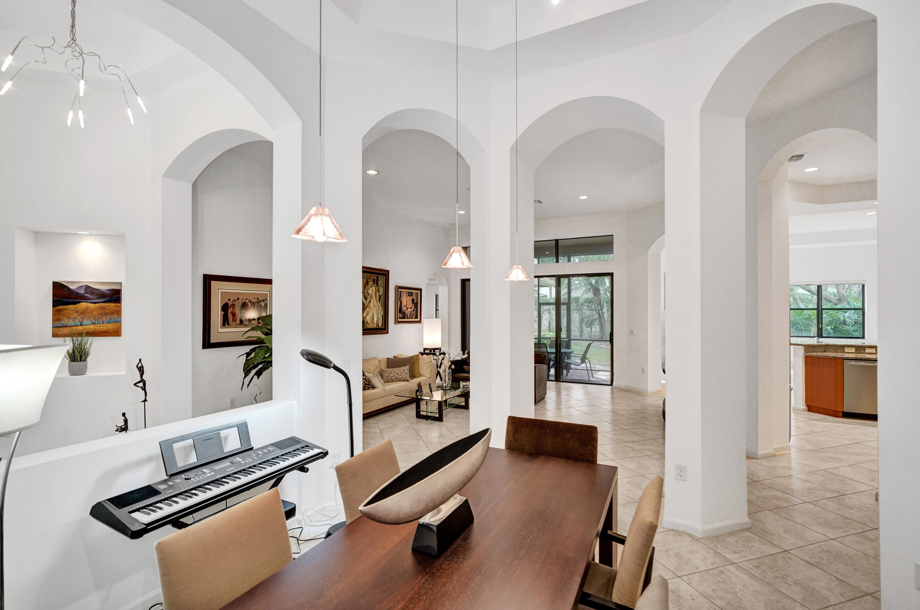 7849 Via Grande Boynton Beach, FL 33437 - Photo 19 of 59 a view of a livingroom with furniture and a flat screen tv