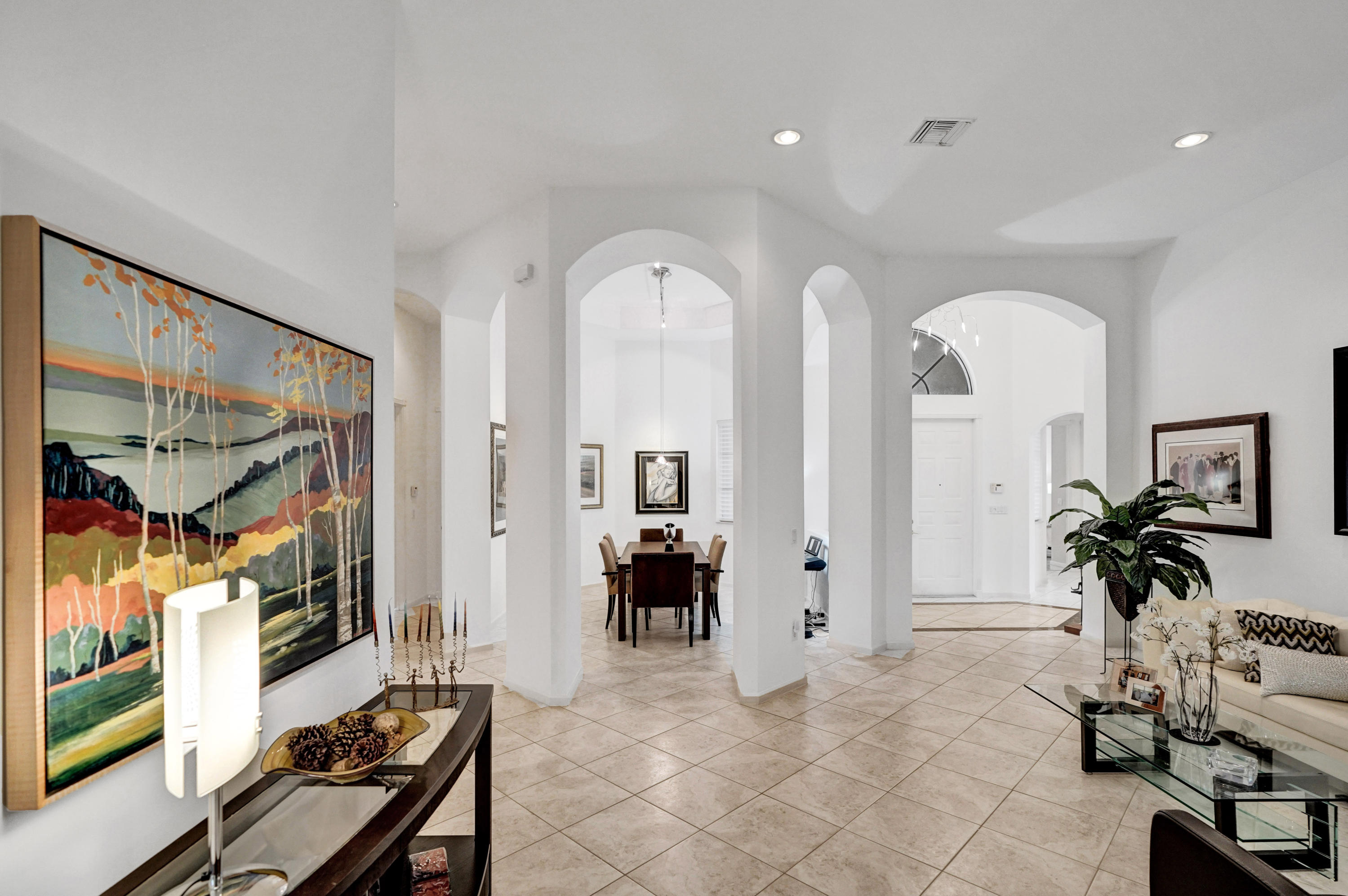 7849 Via Grande Boynton Beach, FL 33437 - Photo 21 of 59 a view of a livingroom with furniture and a potted plant