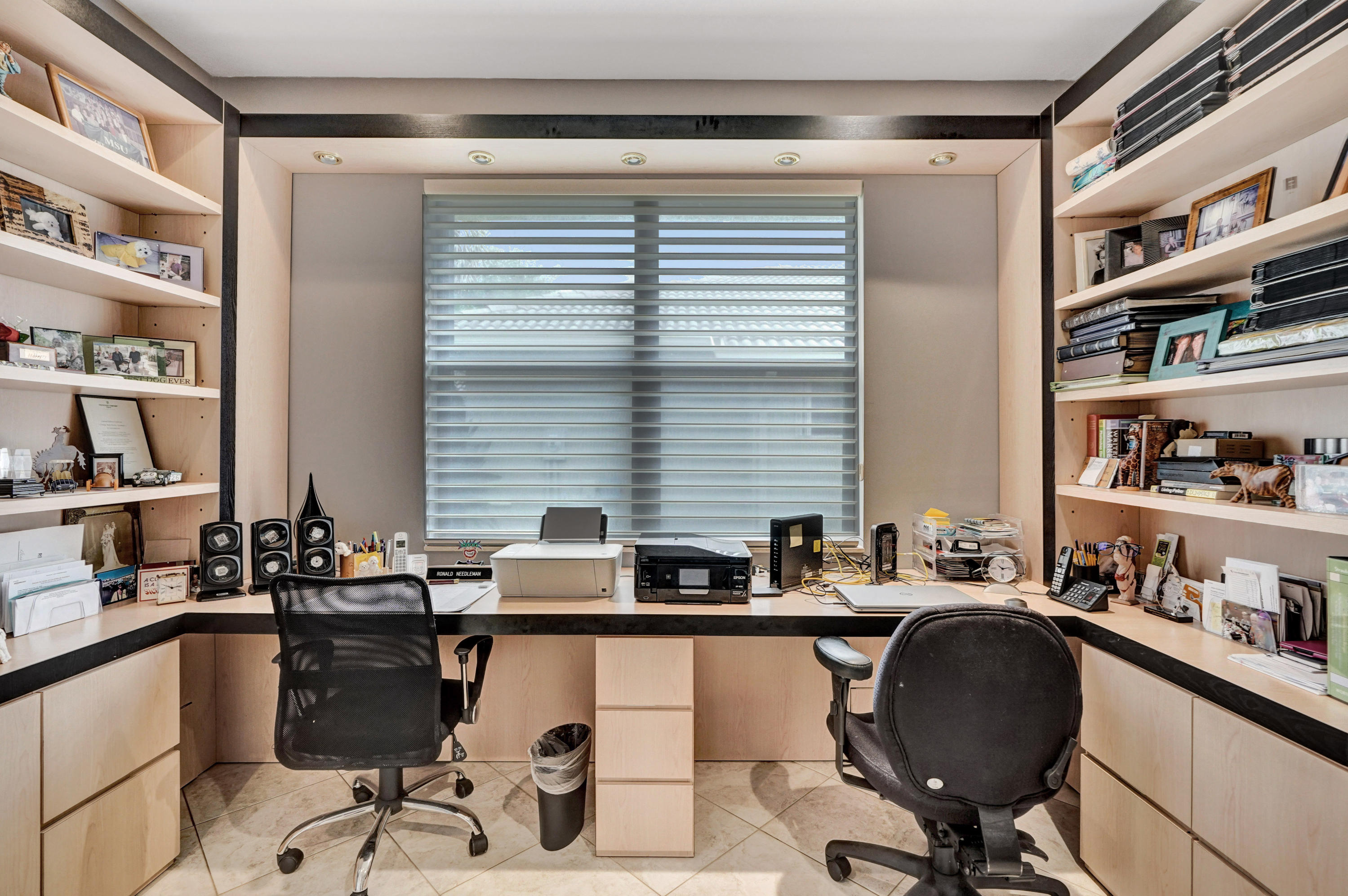 7849 Via Grande Boynton Beach, FL 33437 - Photo 35 of 59 a work place with furniture and a book shelf