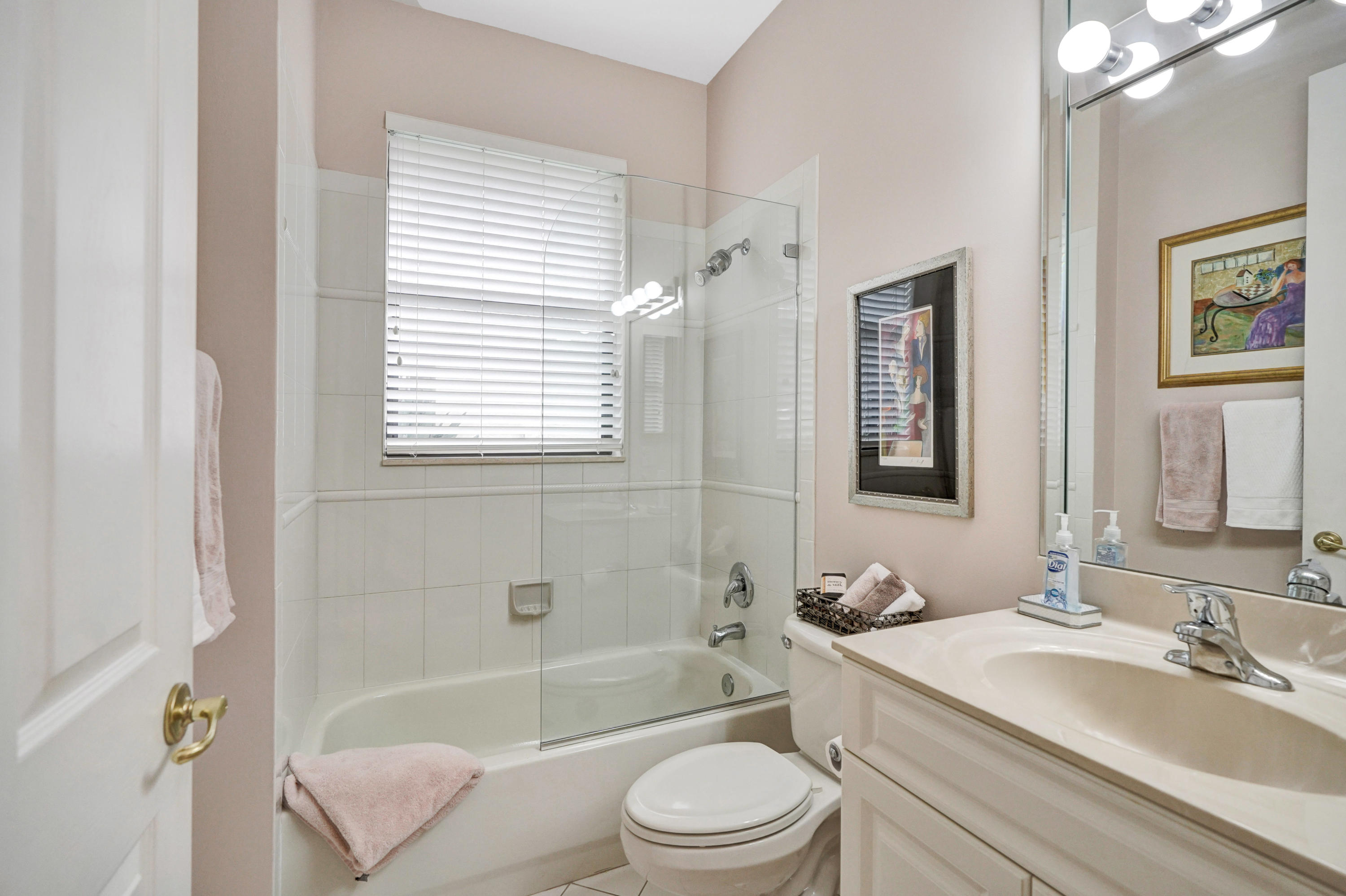 7849 Via Grande Boynton Beach, FL 33437 - Photo 36 of 59 a bathroom with a granite countertop sink toilet tub and shower