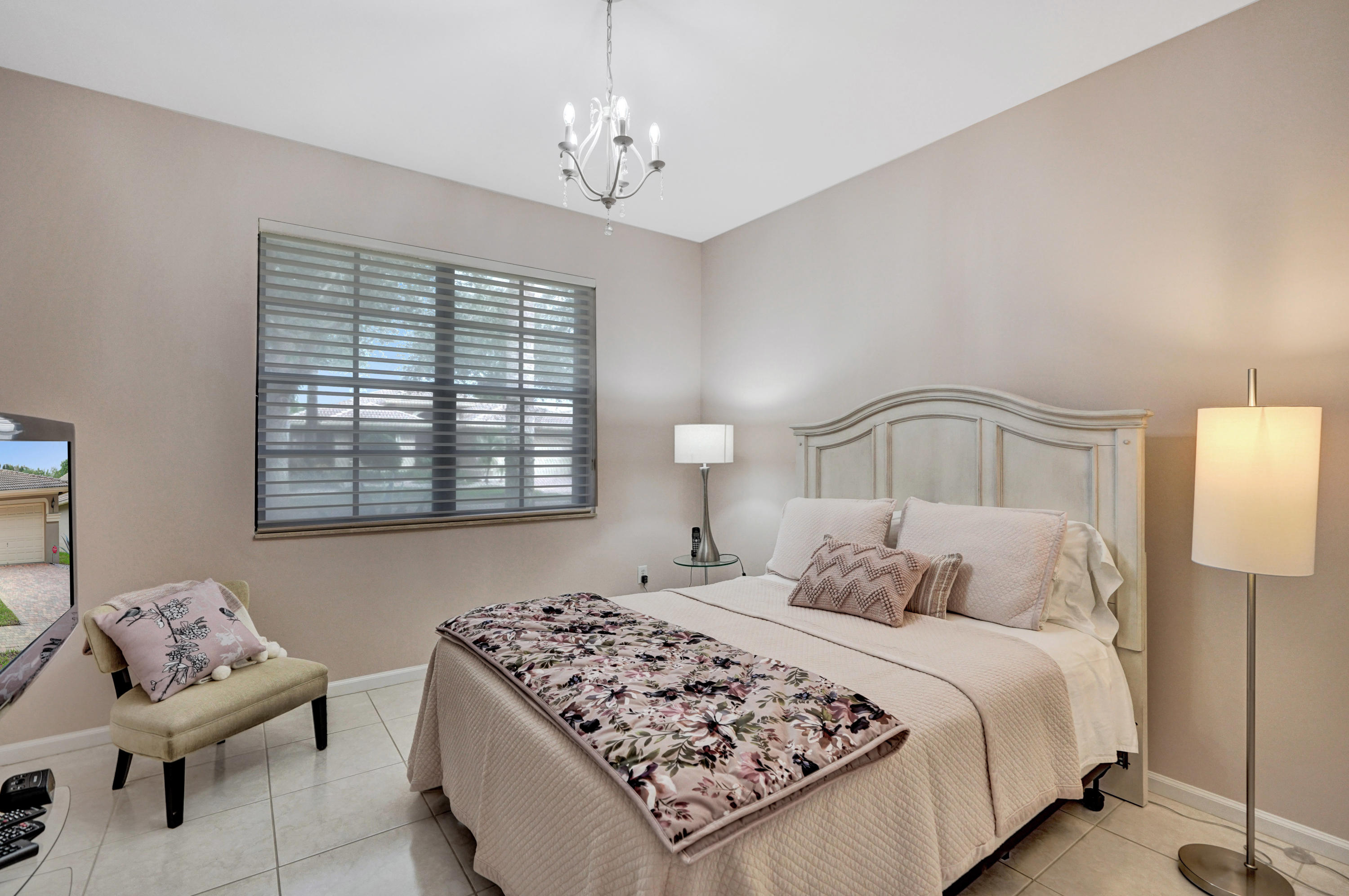 7849 Via Grande Boynton Beach, FL 33437 - Photo 38 of 59 a bedroom with a bed and a couch