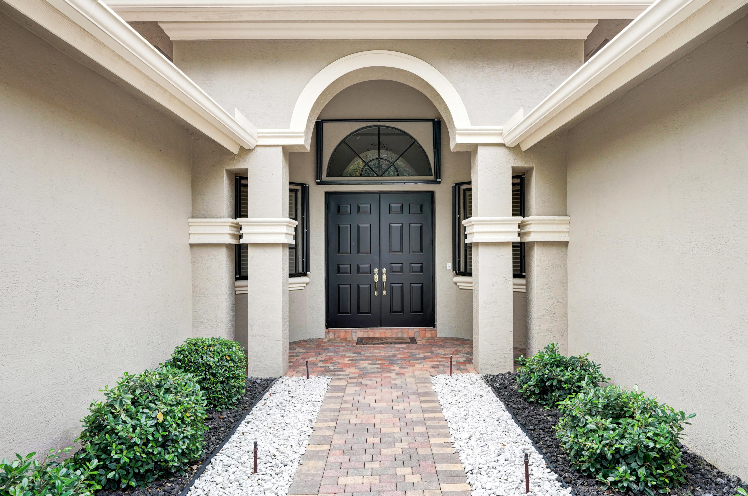 7849 Via Grande Boynton Beach, FL 33437 - Photo 5 of 59 a view of a entrance door of the house