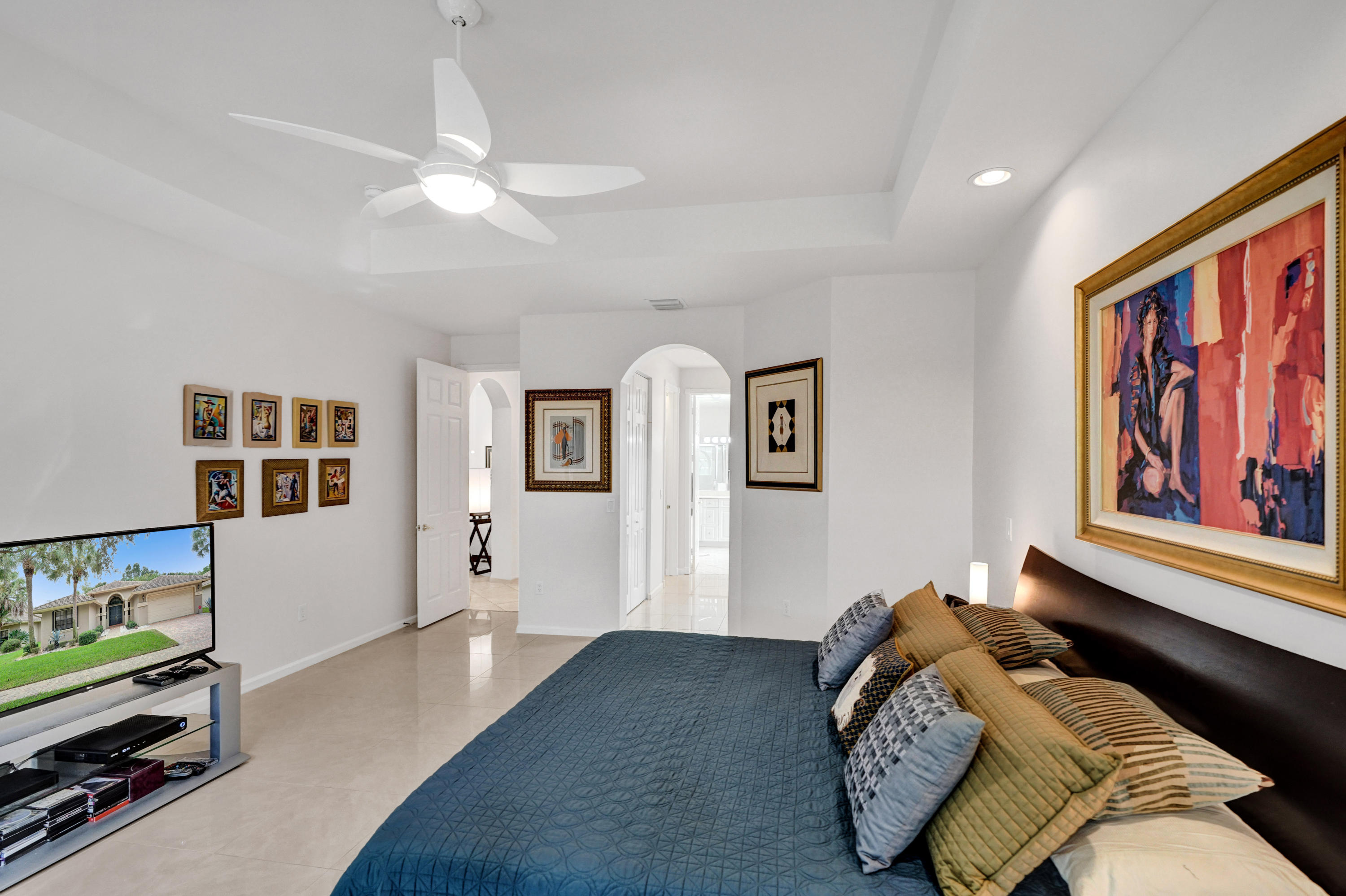 7849 Via Grande Boynton Beach, FL 33437 - Photo 46 of 59 a bedroom with bed and a window