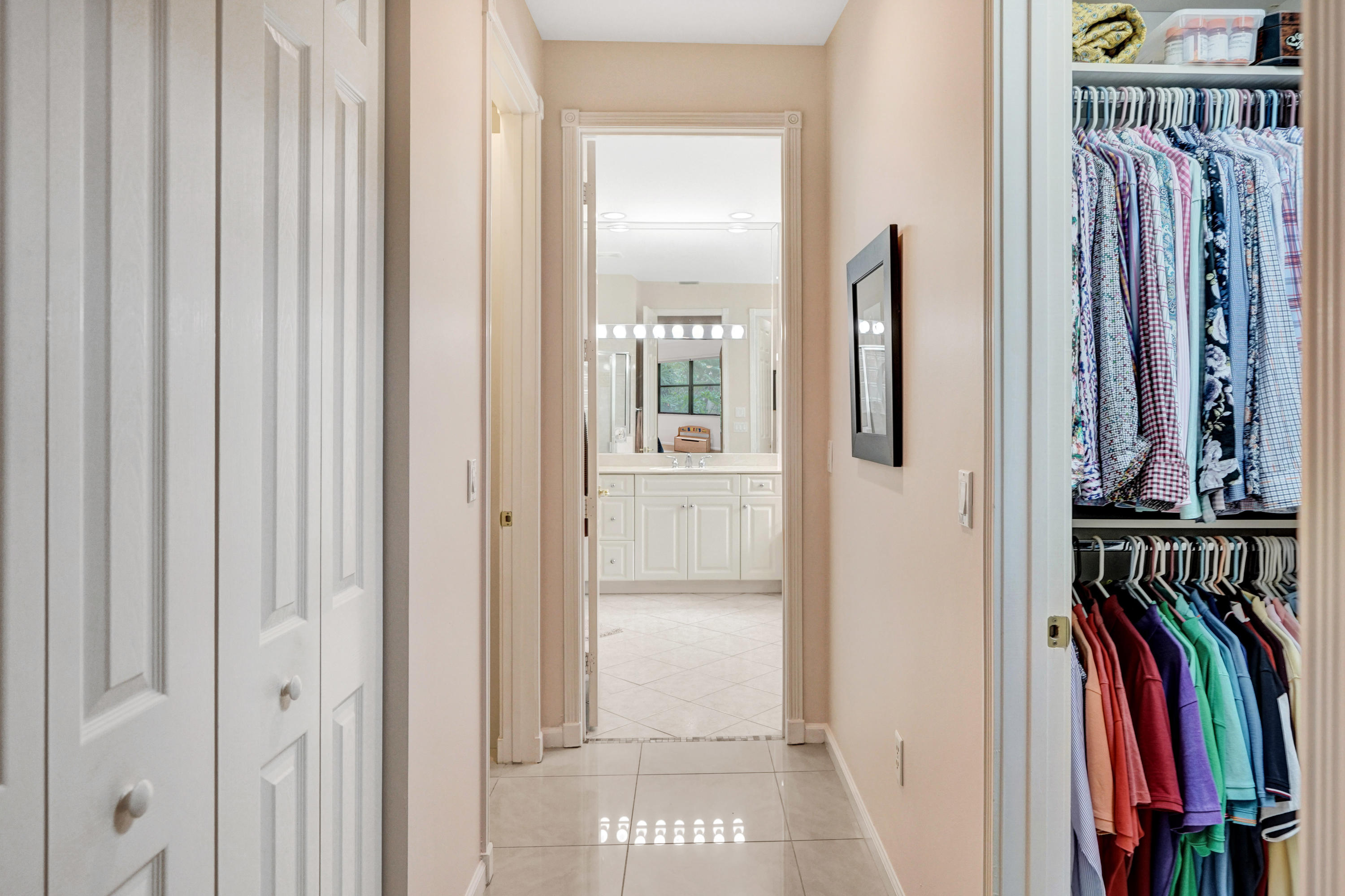 7849 Via Grande Boynton Beach, FL 33437 - Photo 47 of 59 a view of walk in closet with clothes