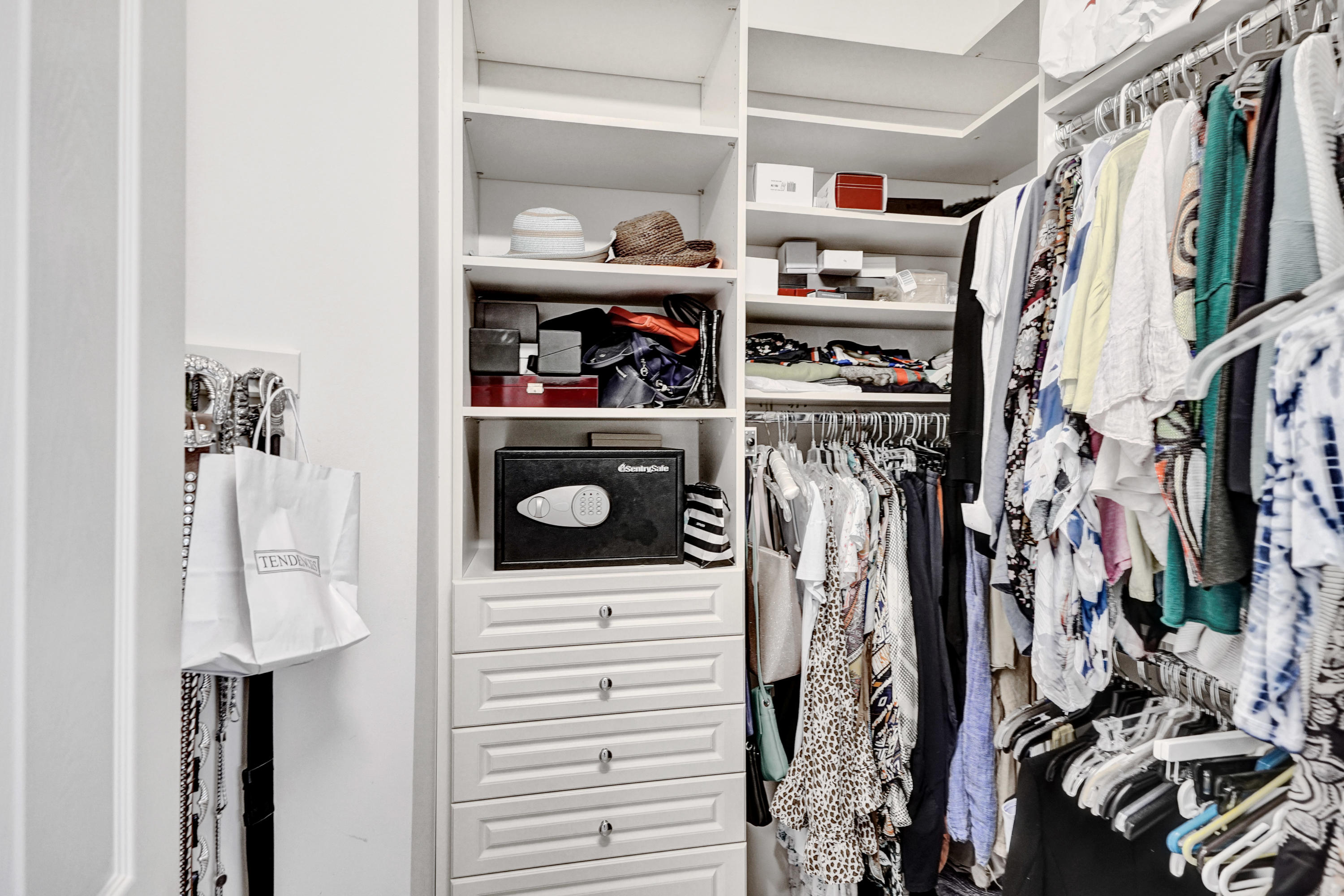 7849 Via Grande Boynton Beach, FL 33437 - Photo 49 of 59 a view of walk in closet with clothes and shoes