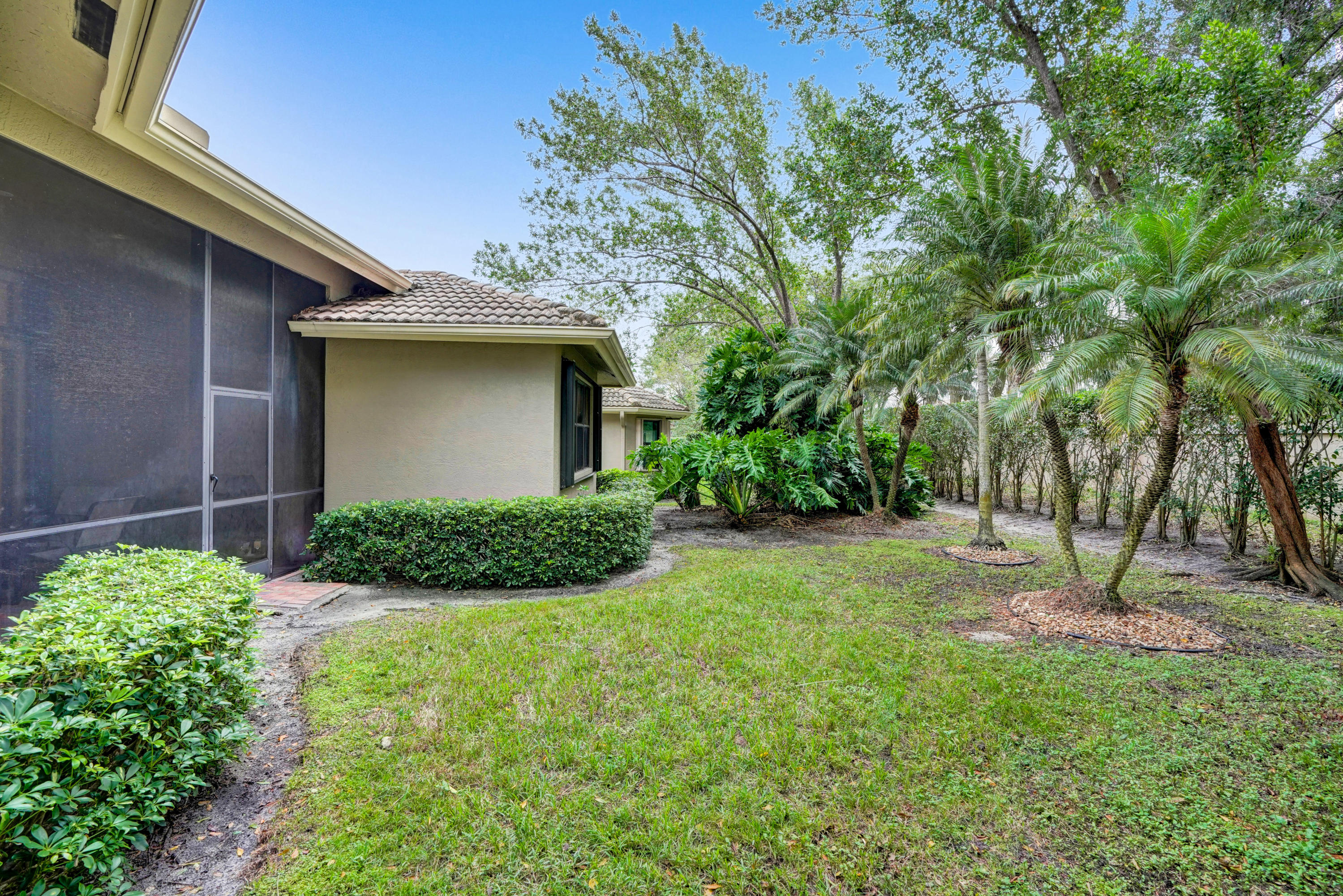 7849 Via Grande Boynton Beach, FL 33437 - Photo 6 of 59 a house with trees in front of it