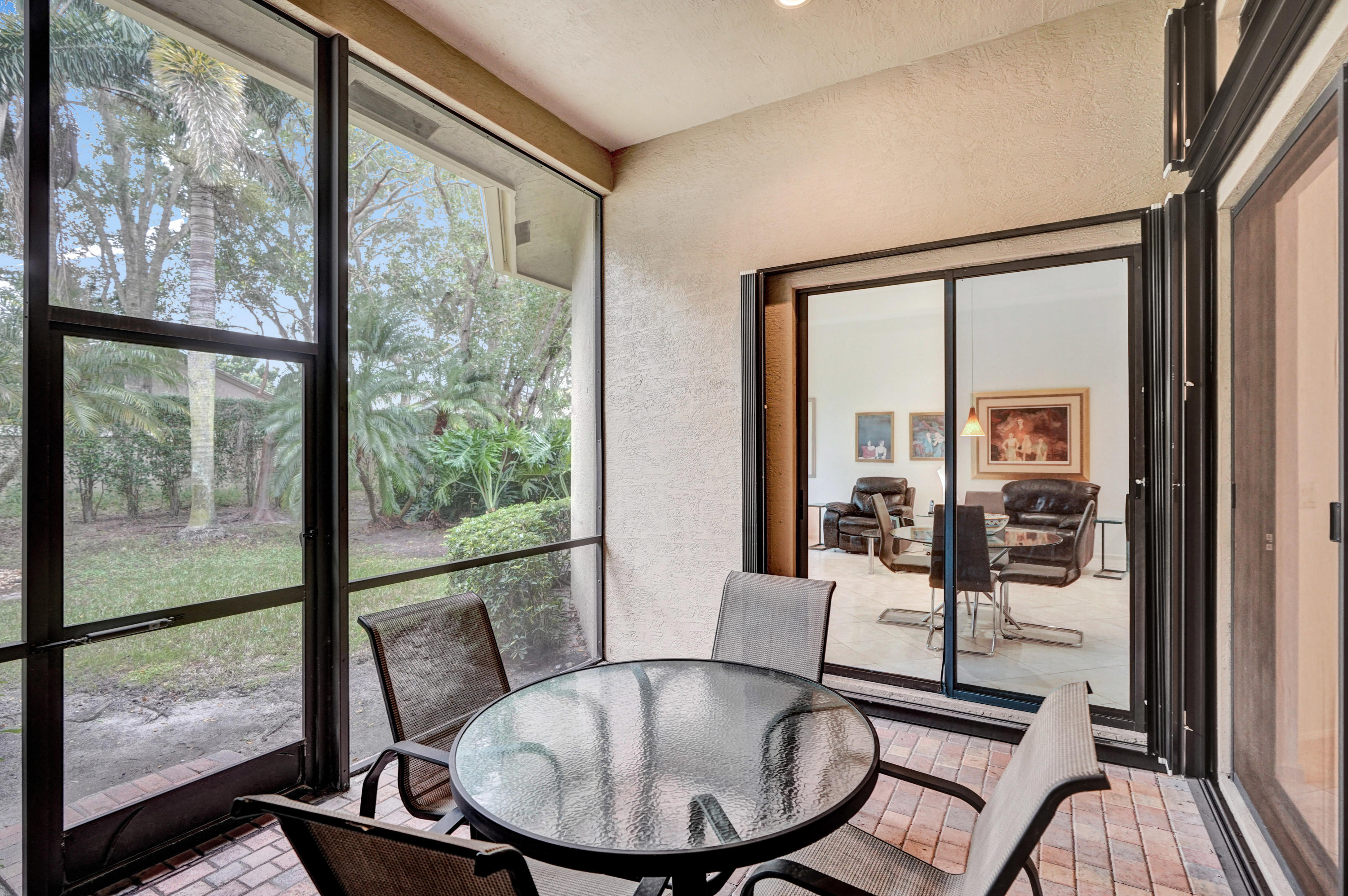 7849 Via Grande Boynton Beach, FL 33437 - Photo 55 of 59 a view of a room with furniture wooden floor and windows