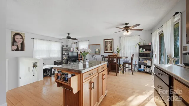 a view of kitchen island kitchen island dining table and chairs