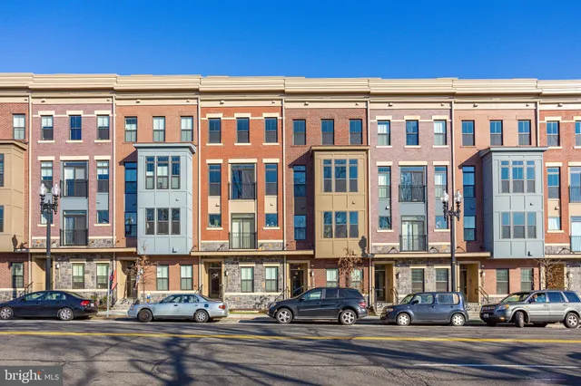 a front view of a building with street view