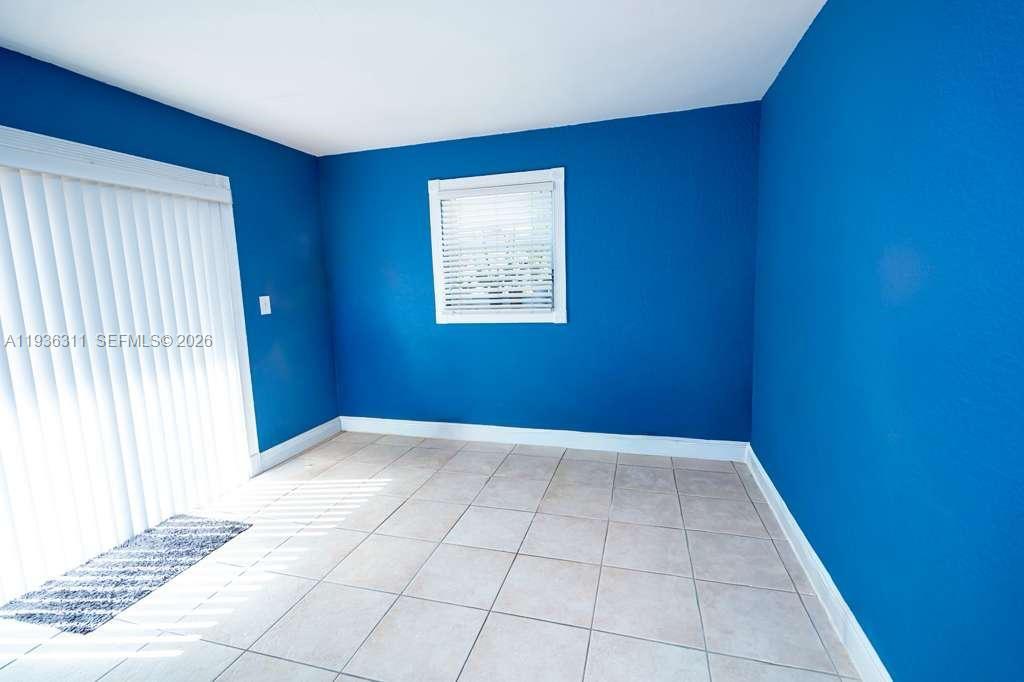 8600 Southwest 109th Avenue, Unit 4114 Miami, FL 33173 - Photo 15 of 44 an empty room with windows