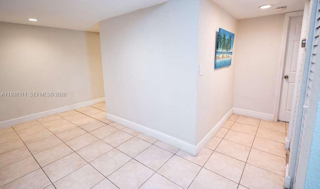 8600 Southwest 109th Avenue, Unit 4114 Miami, FL 33173 - Photo 20 of 44 a view of an empty room and window