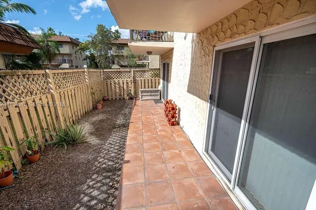 a view of a pathway of a house with wooden floor
