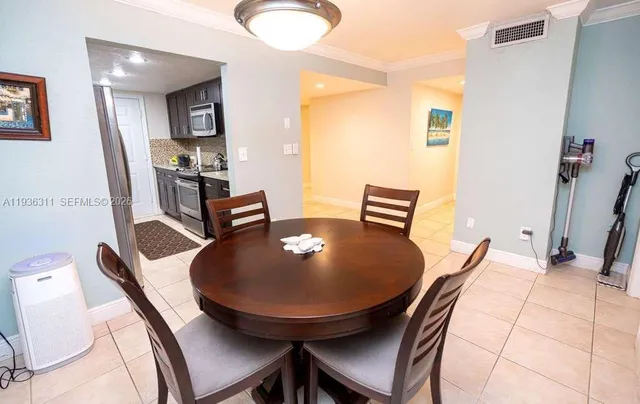 a view of a dining room with furniture
