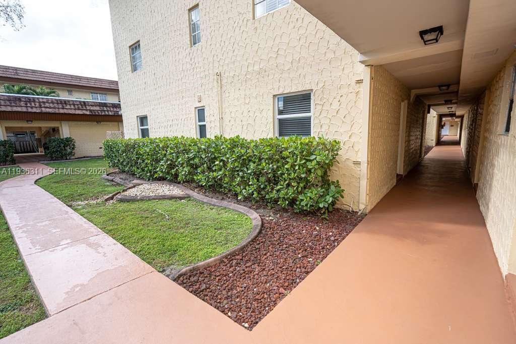 8600 Southwest 109th Avenue, Unit 4114 Miami, FL 33173 - Photo 31 of 44 a view of a back yard of the house