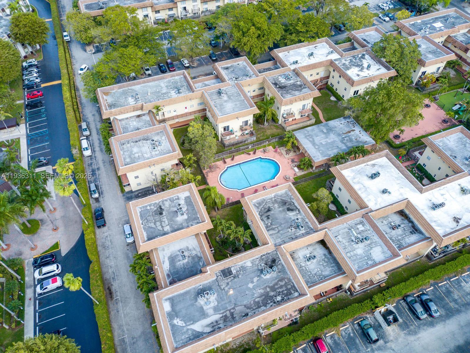 8600 Southwest 109th Avenue, Unit 4114 Miami, FL 33173 - Photo 34 of 44 an aerial view of residential house with outdoor space and parking