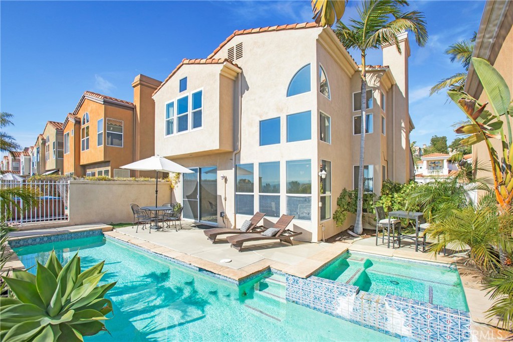 32 Blazewood Lake Forest, CA 92610 - Photo 14 of 41 a view of a patio with couches table and chairs and potted plants