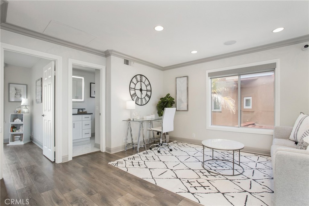 32 Blazewood Lake Forest, CA 92610 - Photo 22 of 41 a living room with furniture and a window