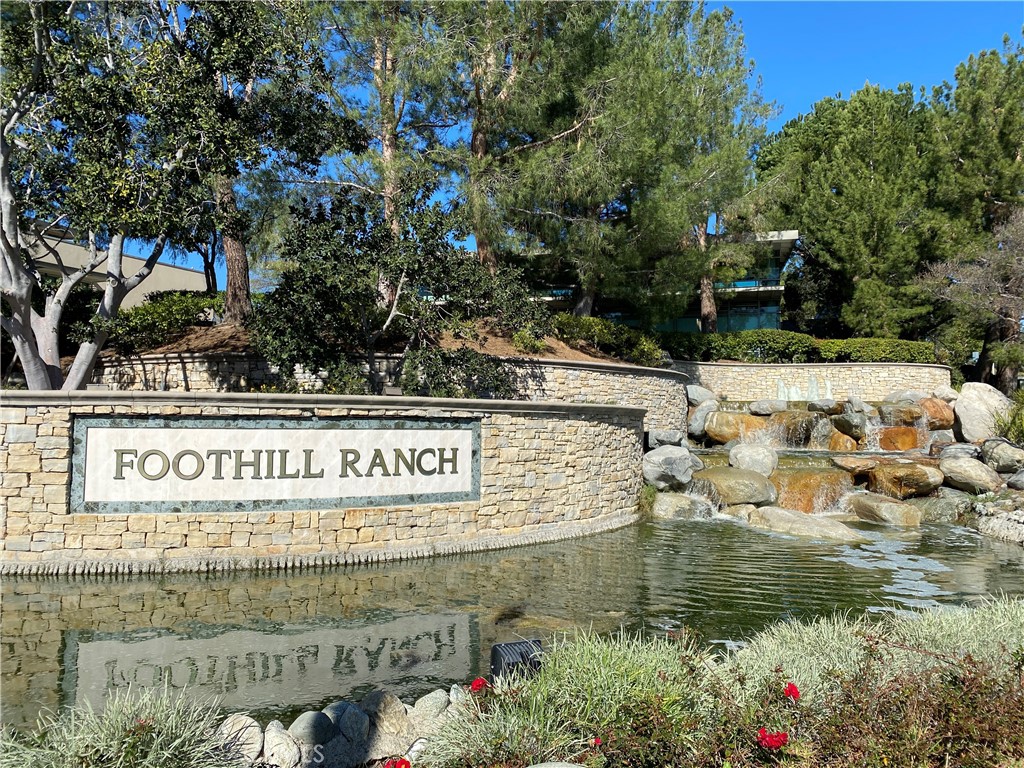 32 Blazewood Lake Forest, CA 92610 - Photo 34 of 41 a view of swimming pool with a building in the background