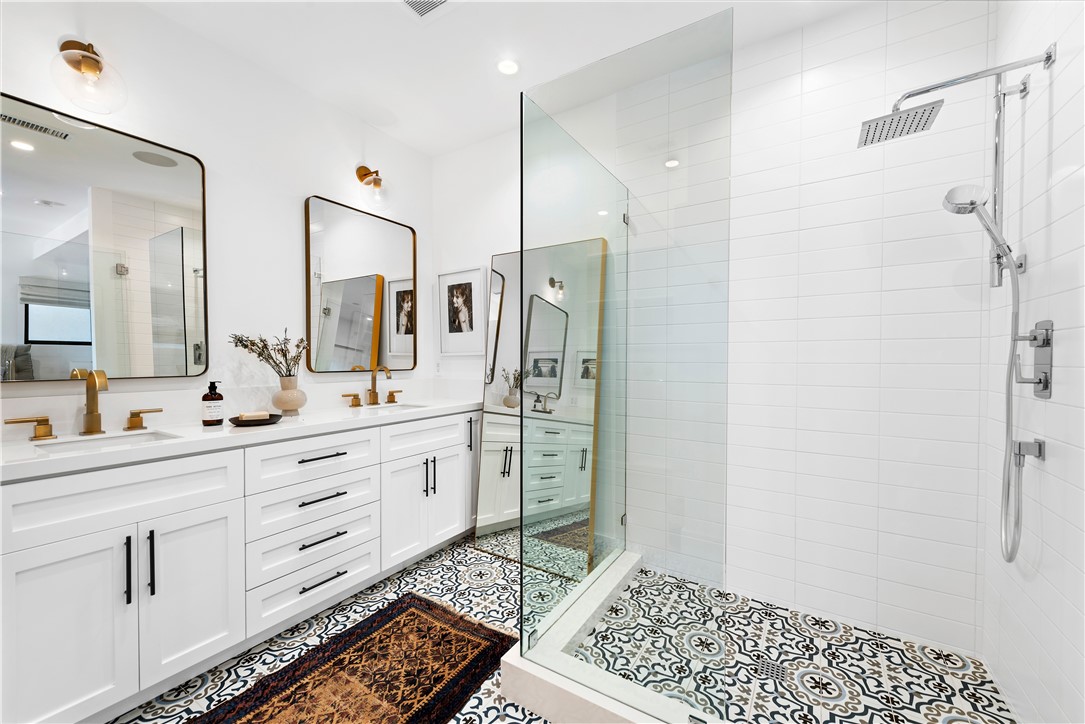 616 1/2 Acacia Avenue Corona del Mar, CA 92625 - Photo 14 of 20 a spacious bathroom with double vanity and a shower