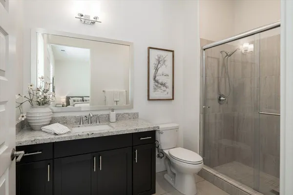 a kitchen with a sink cabinets and a microwave oven