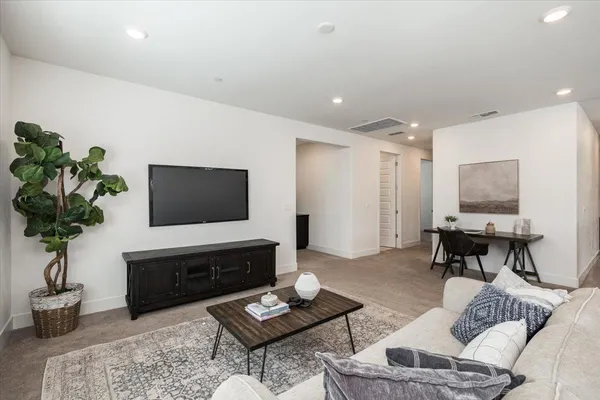 a bedroom with a bed and a walk in closet