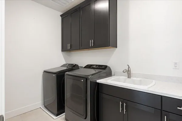 a living room with furniture potted plant and a window
