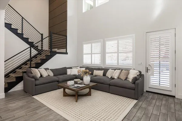 a living room with furniture and a window