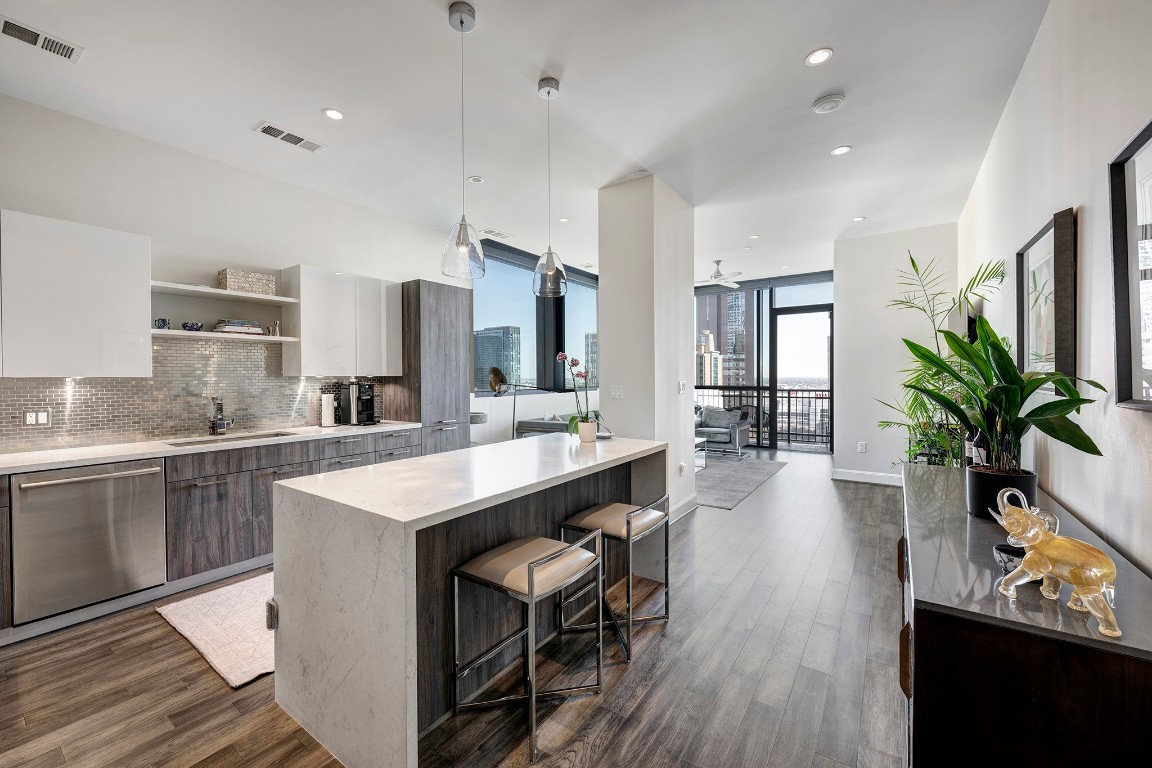 Open-concept kitchen and living area designed for seamless flow, effortless entertaining, and everyday living.