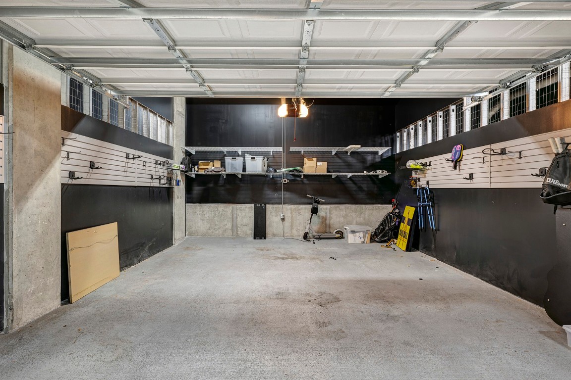1211 Caroline Street, Unit 1501 Houston, TX 77002 - Photo 21 of 40 Garage interior highlighting added storage and updates.