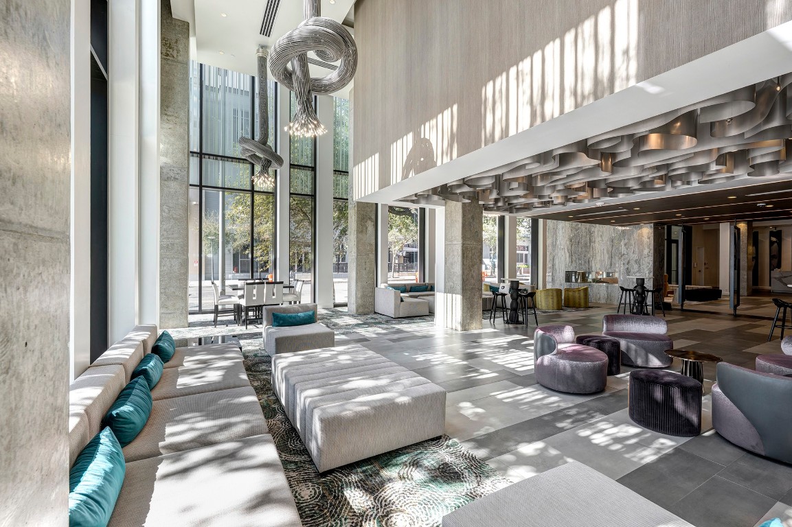 1211 Caroline Street, Unit 1501 Houston, TX 77002 - Photo 25 of 40 Lobby view highlighting its modern design and the option for residents to rent the space for private events.