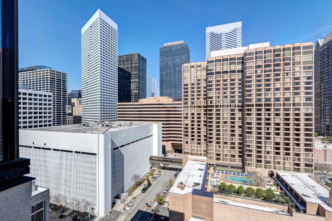 1211 Caroline Street, Unit 1501 Houston, TX 77002 - Photo 32 of 40 View from the pool deck overlooking Downtown Houston.