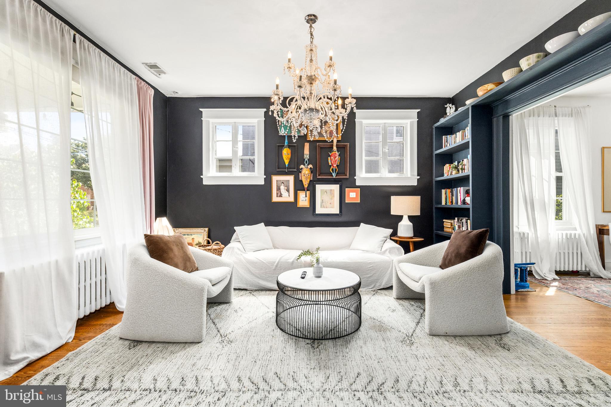 a living room with furniture and window
