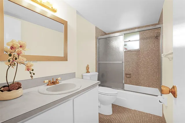 a room with view of a balcony and chairs