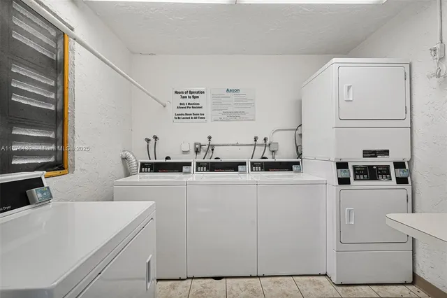 a view of a swimming pool with a yard