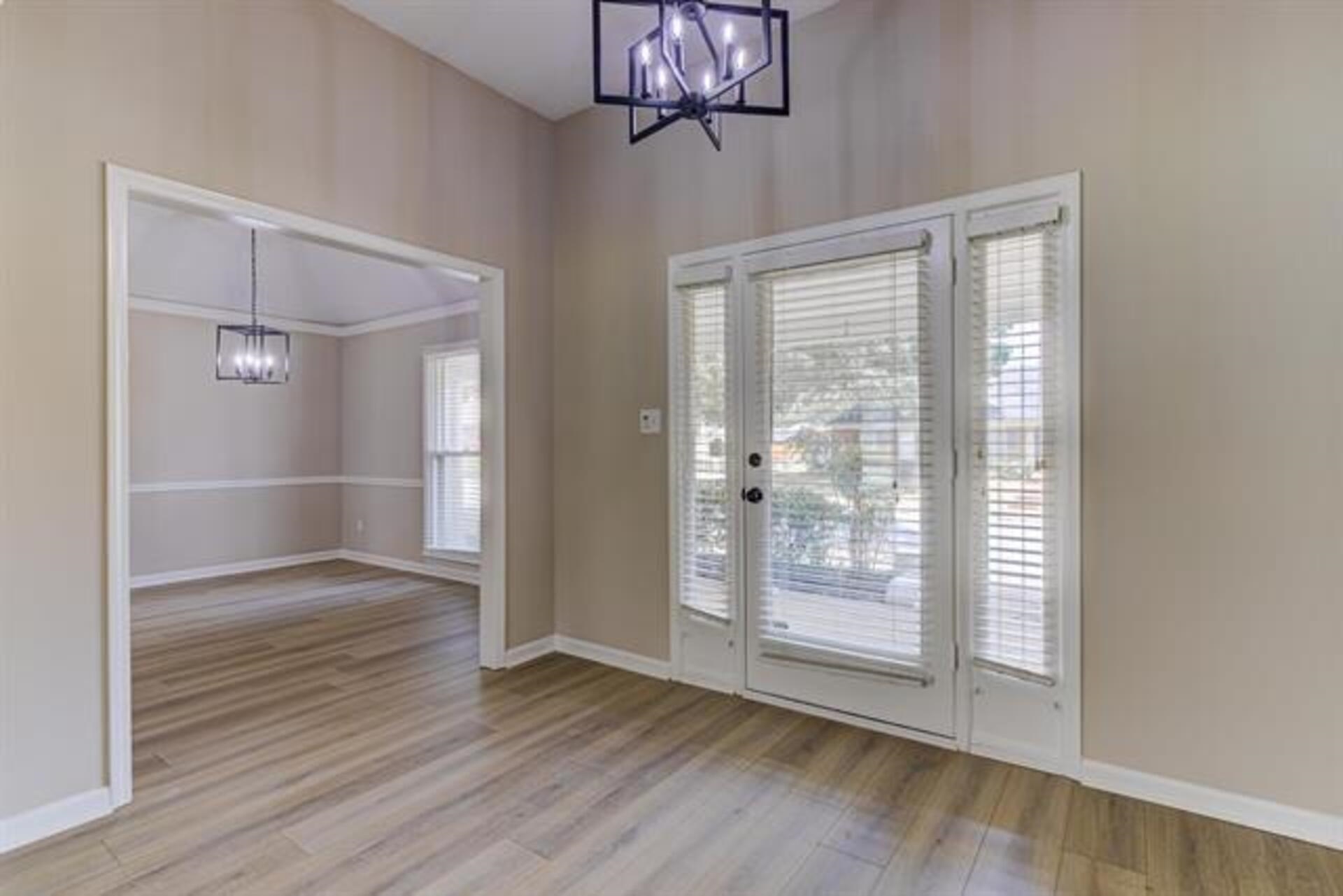 1937 Ada Lane Memphis, TN 38016 - Photo 10 of 28 a view of empty room with wooden floor and fan