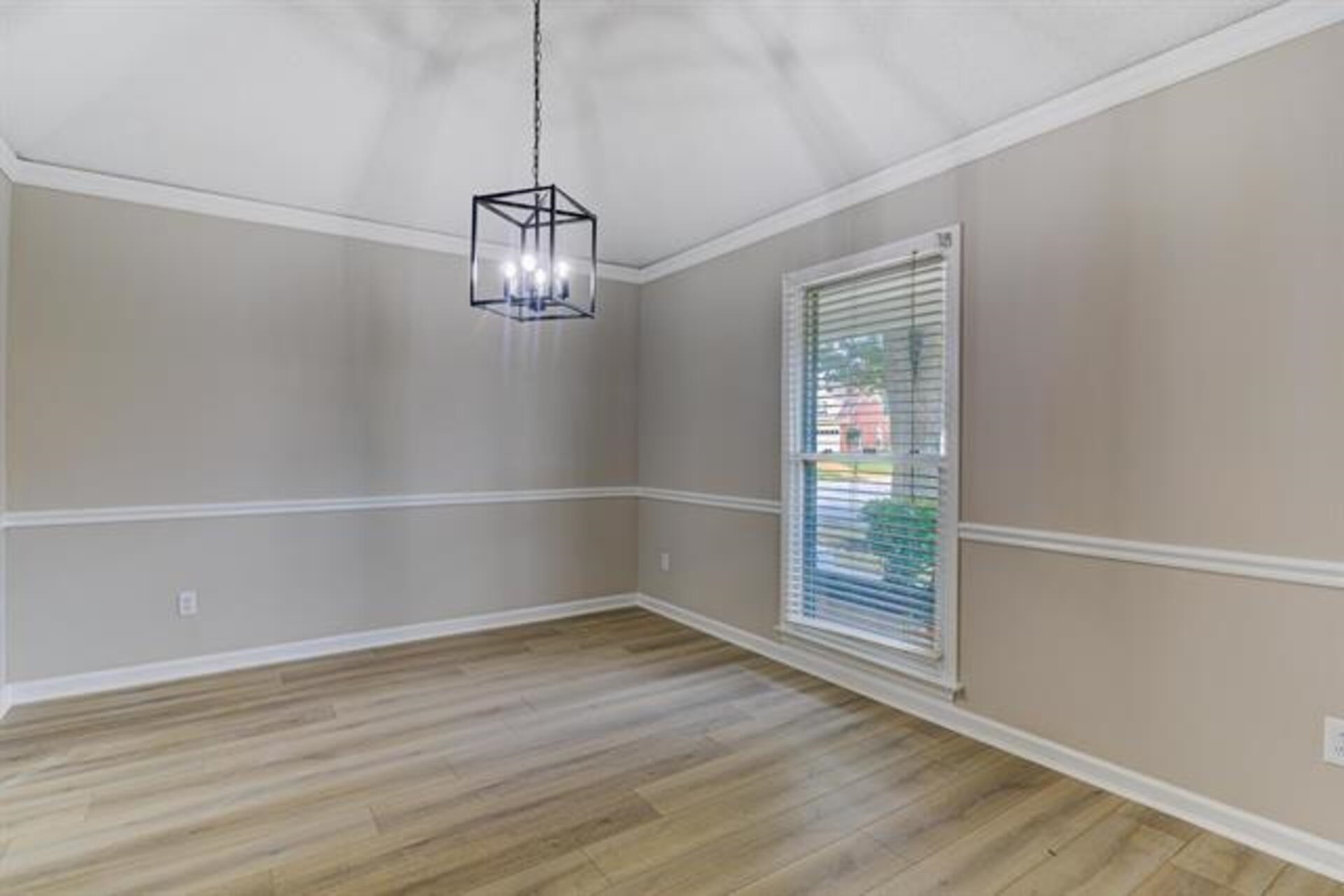1937 Ada Lane Memphis, TN 38016 - Photo 11 of 28 a view of empty room with wooden floor and fan
