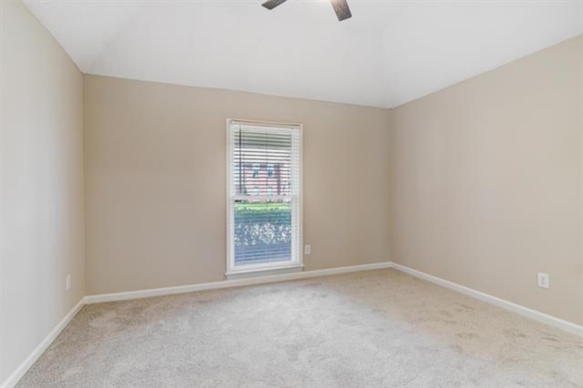 1937 Ada Lane Memphis, TN 38016 - Photo 16 of 28 an empty room with a window