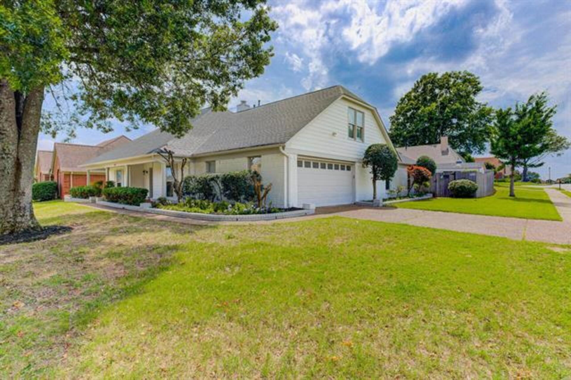 1937 Ada Lane Memphis, TN 38016 - Photo 2 of 28 a front view of a house with swimming pool and porch