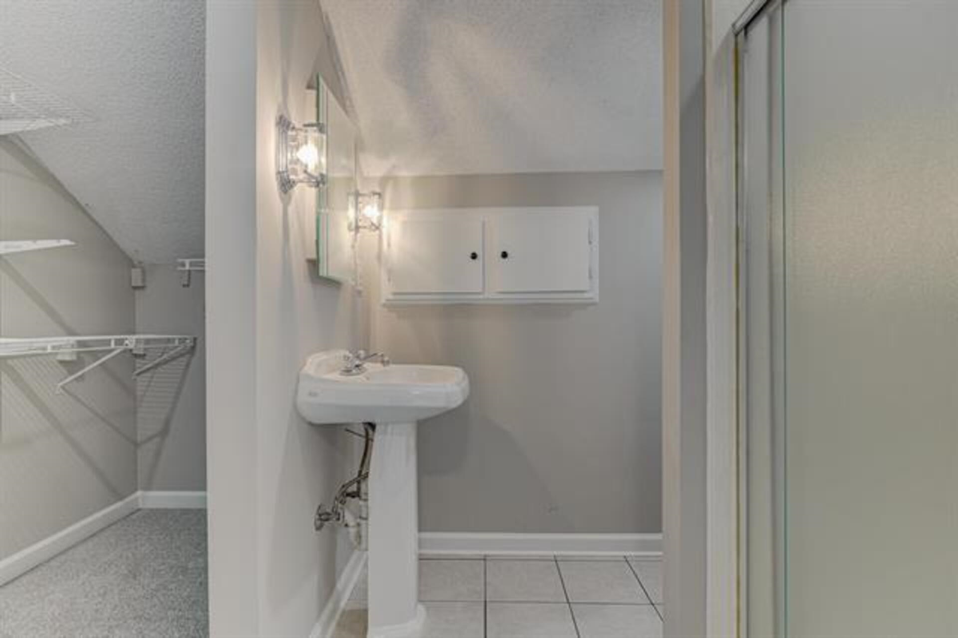 1937 Ada Lane Memphis, TN 38016 - Photo 23 of 28 a bathroom with a sink a toilet and shower