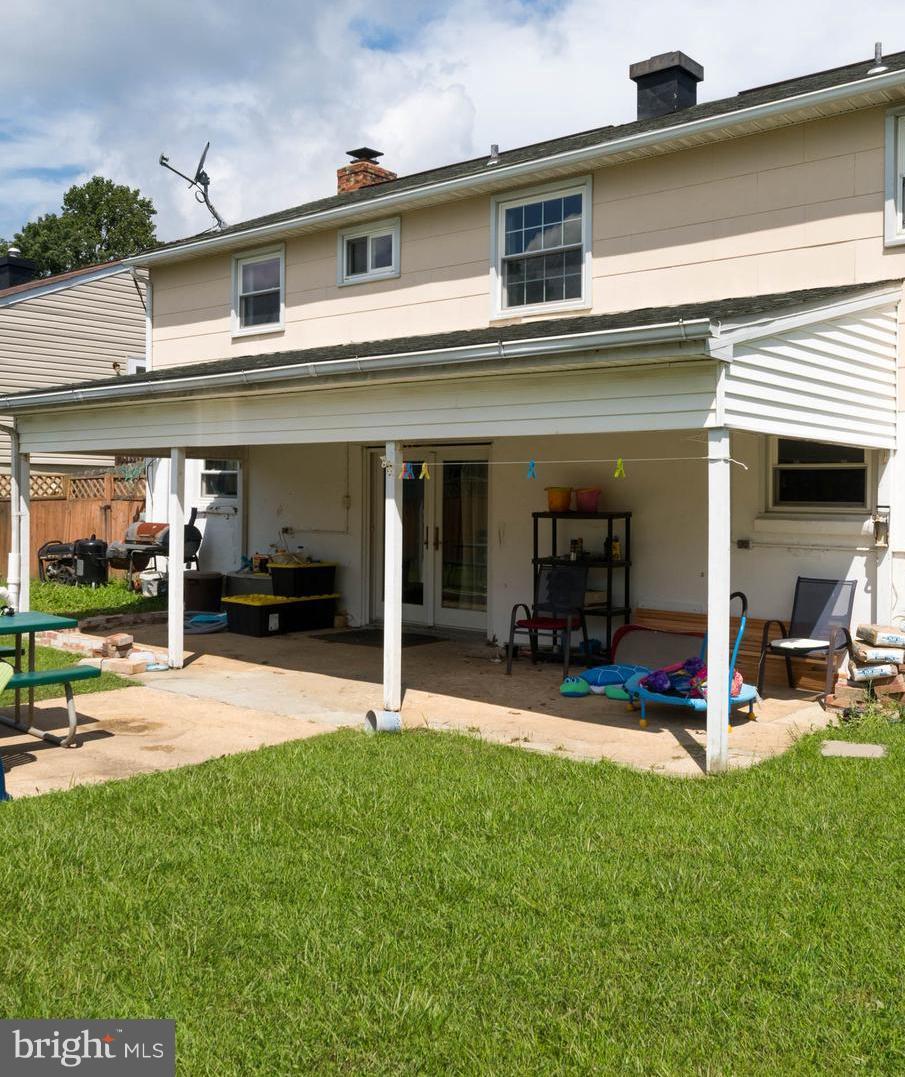 517 Holy Cross Road Baltimore, MD 21225 - Photo 25 of 28 Exterior - covered patio, leads to family room