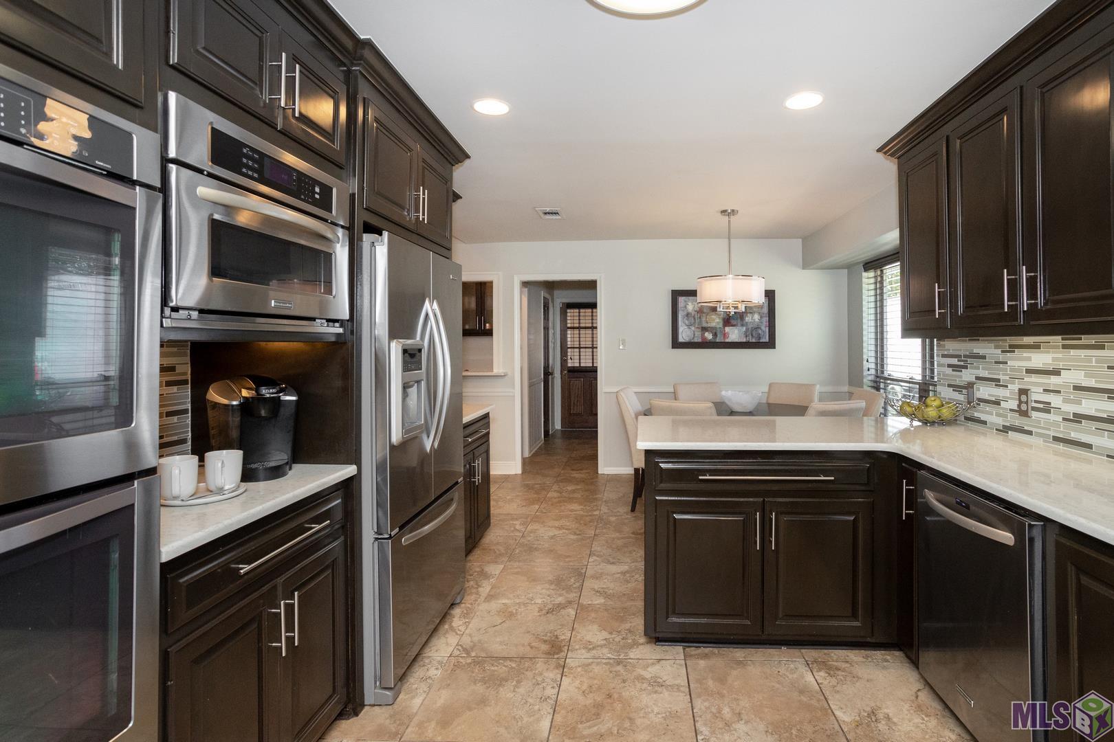 14012 Woodland Ridge Avenue Baton Rouge, LA 70816 - Photo 3 of 46 Updated Kitchen with SS appliances