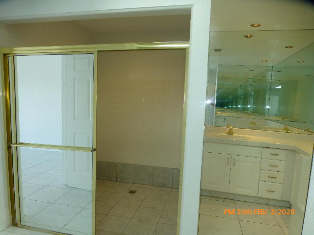 45696 Cimarron Road Indio, CA 92201 - Photo 14 of 26 a bathroom with a shower