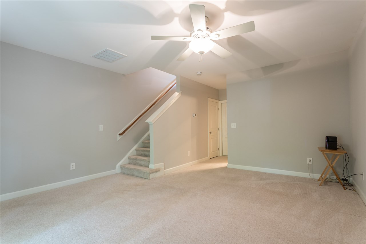 8013 Fanleaf Trail Raleigh, NC 27612 - Photo 24 of 29 Finished Basement