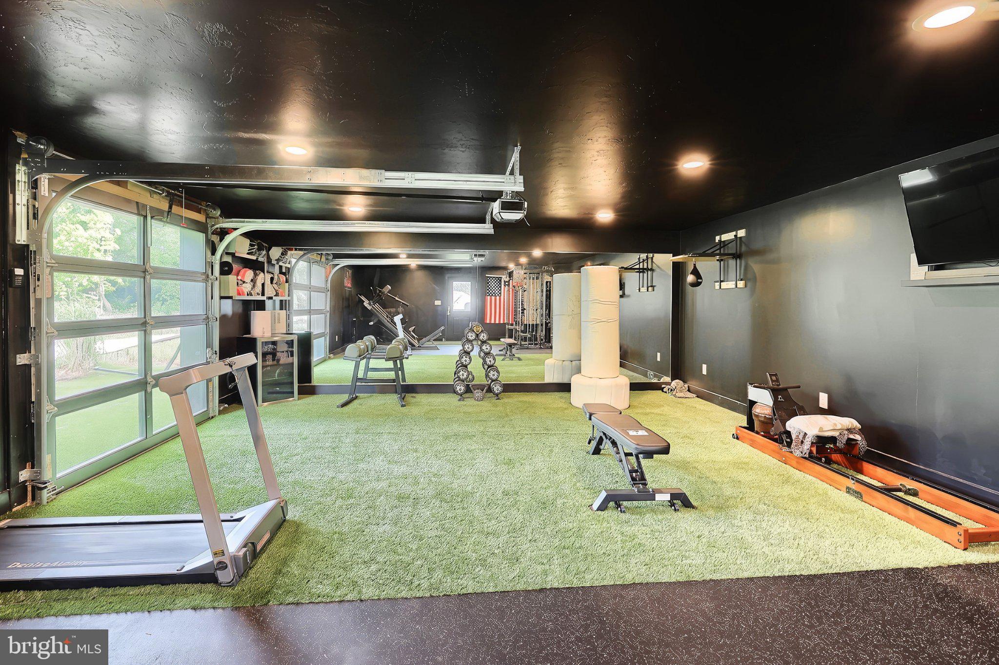 1001 Frederick Pike Littlestown, PA 17340 - Photo 37 of 53 Modern home gym with vibrant turf.