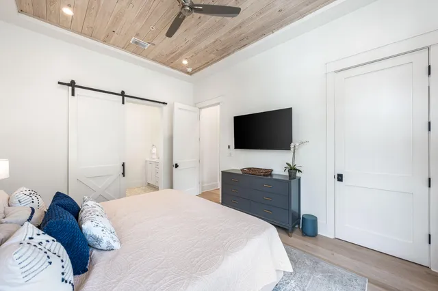 a bathroom with a sink vanity and a mirror