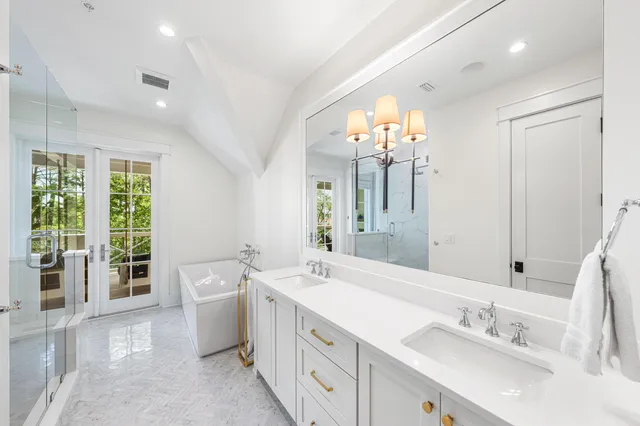 a living room with furniture a flat screen tv and a large window