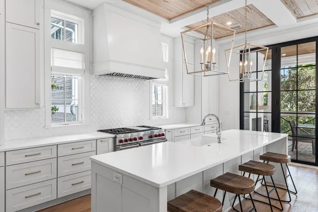 a view of a patio with table and chairs
