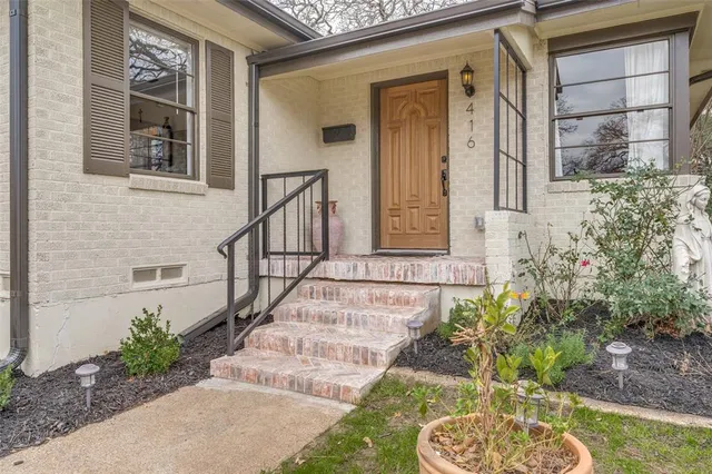 a view of a entryway door front of house