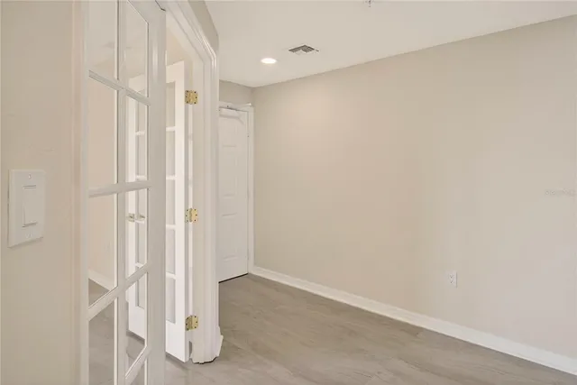 an empty room with windows