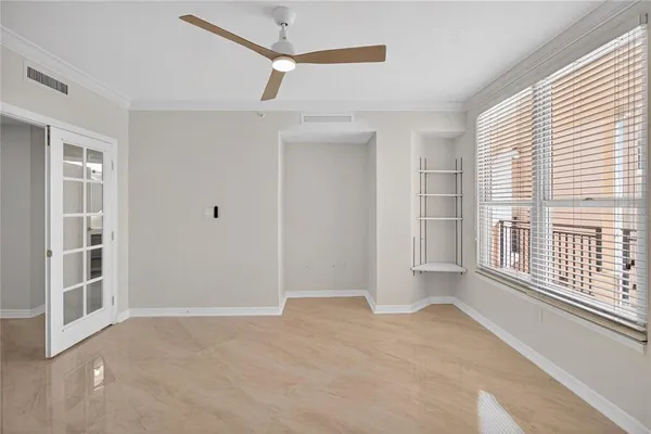 an empty room with a empty shelves